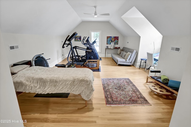 bedroom featuring lofted ceiling, hardwood / wood-style flooring, and ceiling fan