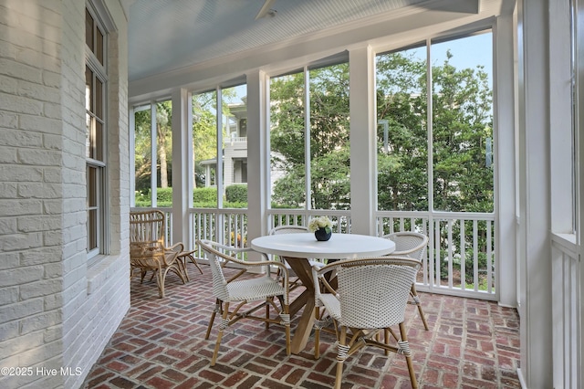 sunroom / solarium with plenty of natural light