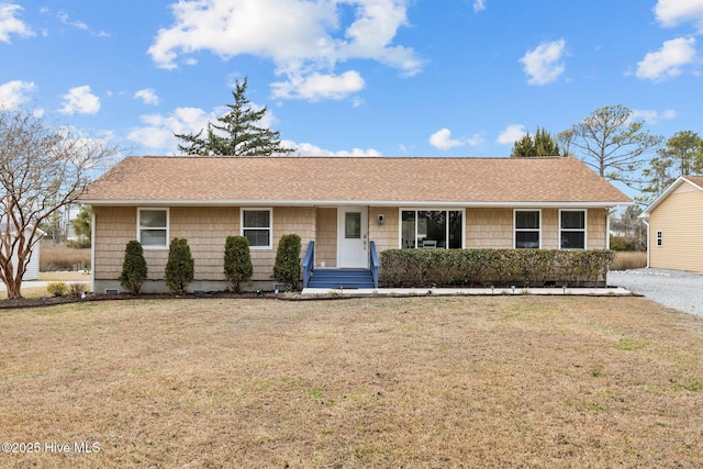 single story home with a front yard