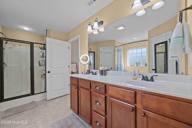 bathroom featuring vanity and walk in shower