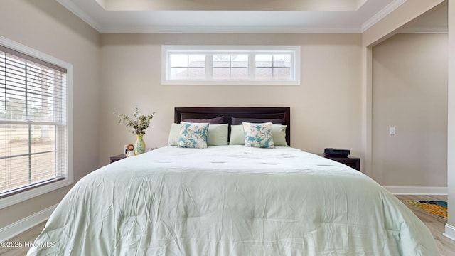 bedroom with crown molding and wood-type flooring