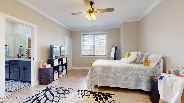 bedroom featuring ornamental molding, connected bathroom, ceiling fan, and light hardwood / wood-style floors