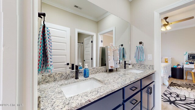 bathroom with crown molding and toilet