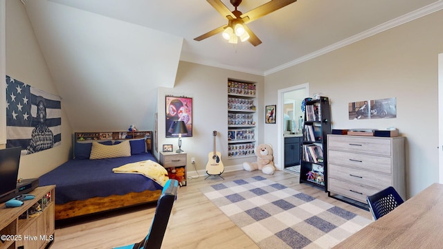 bedroom with ornamental molding, ceiling fan, and light hardwood / wood-style flooring