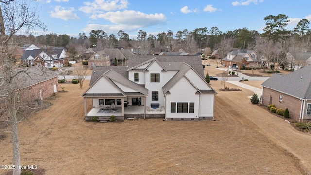 rear view of house featuring a patio area