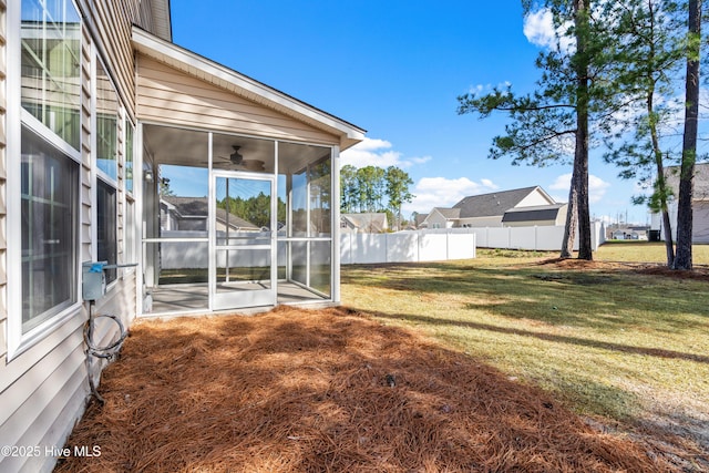 view of yard featuring a sunroom