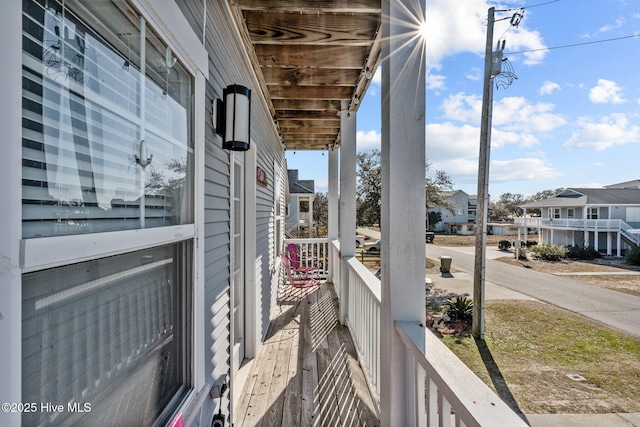 balcony featuring a porch