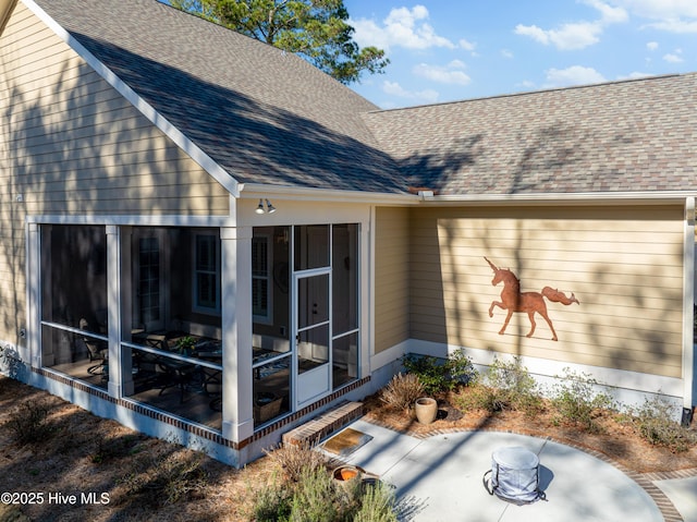 3604 Haughton Ln, Castle Hayne, NC 28429 - rear view of house featuring a sunroom and a shingled roof
