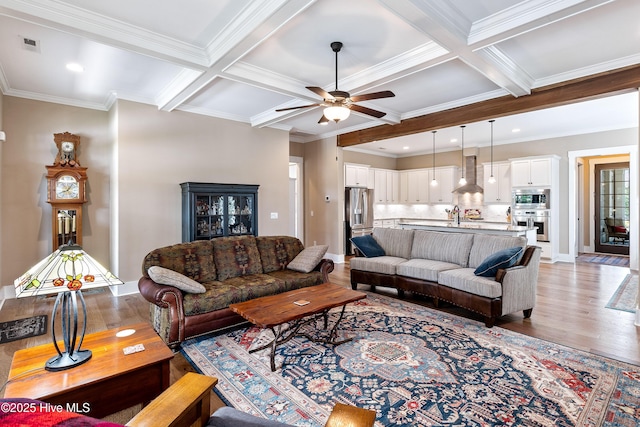 3604 Haughton Ln, Castle Hayne, NC 28429 - living room with light wood finished floors, a ceiling fan, coffered ceiling, beamed ceiling, and baseboards