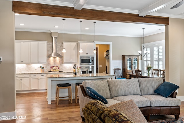 3604 Haughton Ln, Castle Hayne, NC 28429 - living area featuring a chandelier, light wood-type flooring, recessed lighting, beam ceiling, and crown molding