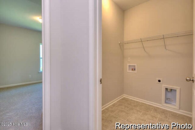 washroom featuring electric dryer hookup and hookup for a washing machine