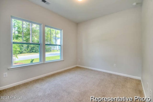 view of carpeted spare room