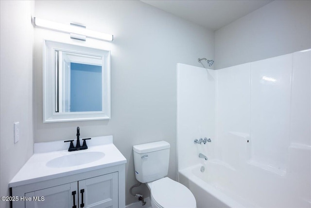 full bathroom featuring vanity, tub / shower combination, and toilet