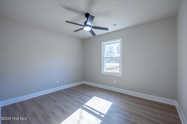 unfurnished room with ceiling fan and light hardwood / wood-style floors