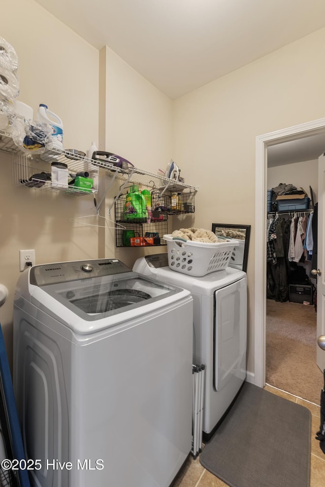 washroom with independent washer and dryer and light colored carpet