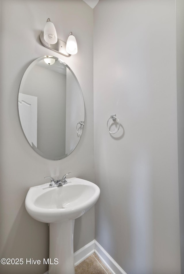 bathroom with baseboards