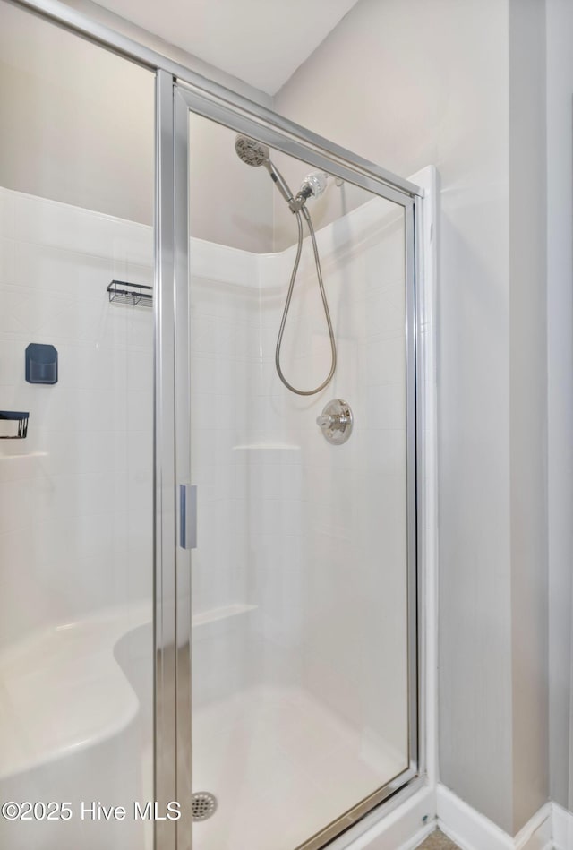 bathroom with a stall shower