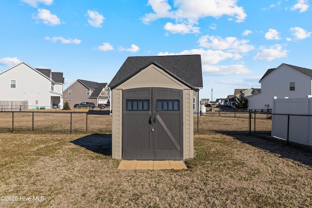 view of outdoor structure featuring a yard