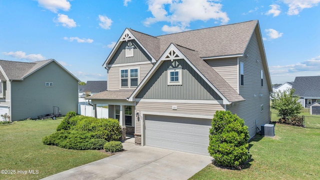 craftsman inspired home with a garage, board and batten siding, central air condition unit, driveway, and roof with shingles