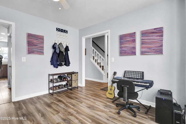 office featuring hardwood / wood-style floors and ceiling fan