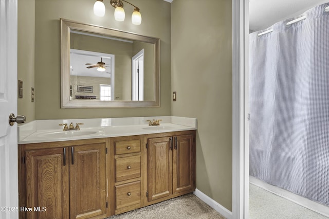 bathroom featuring ceiling fan and vanity