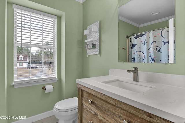 bathroom featuring crown molding, vanity, toilet, and a shower with curtain