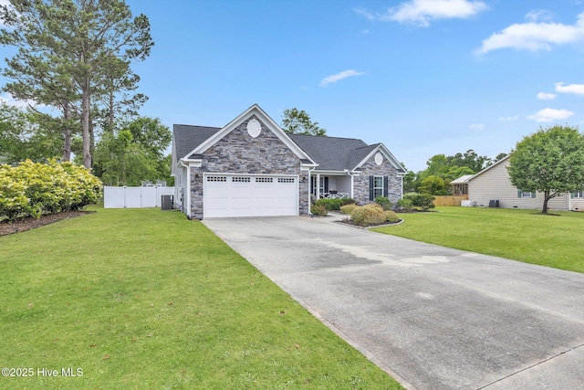view of front facade with stone siding, driveway, and an attached garage