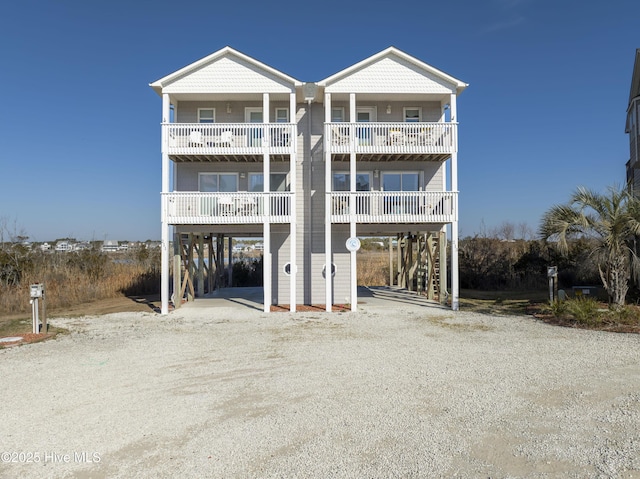 view of front of property with a carport