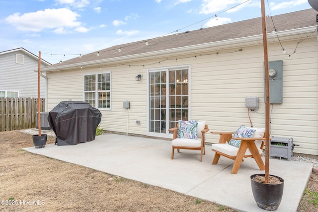 back of house featuring a patio and central AC