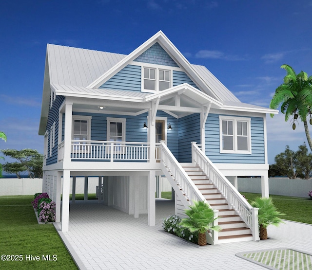 view of front of home featuring a carport and covered porch