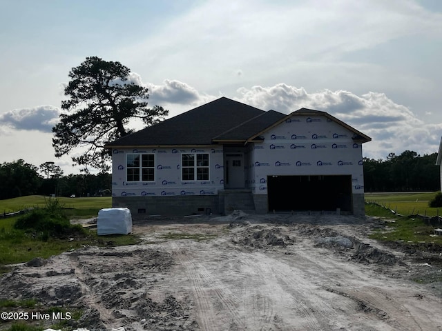 1132 Coral Reef Dr, New Bern, NC 28560 - property in mid-construction featuring a garage and driveway