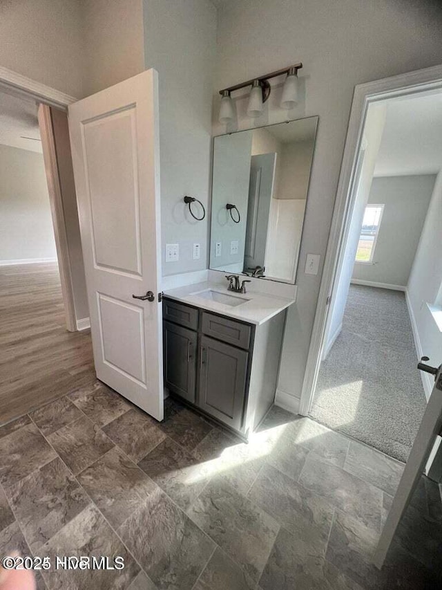 1132 Coral Reef Dr, New Bern, NC 28560 - bathroom with vanity and baseboards