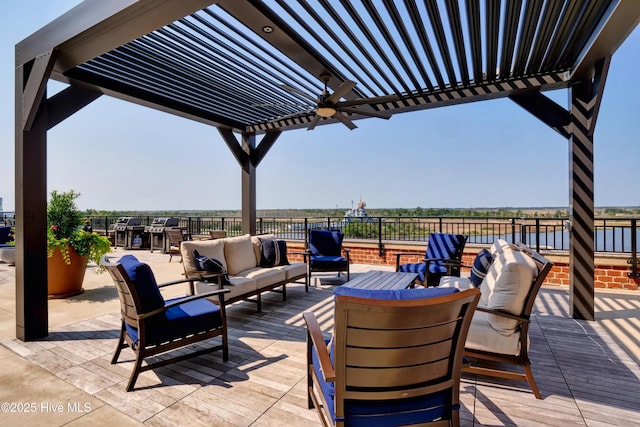 view of patio / terrace featuring an outdoor living space and a pergola