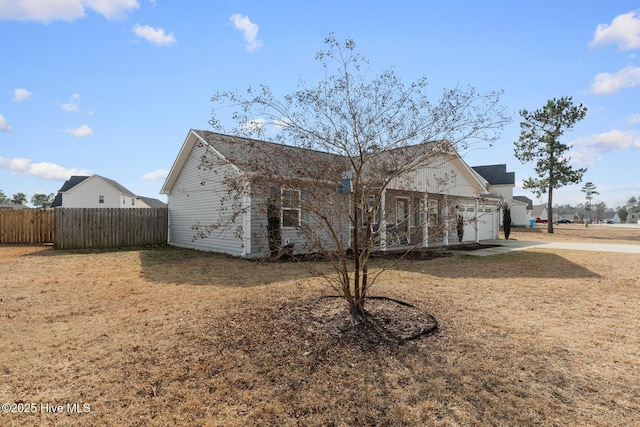 view of property exterior featuring a yard