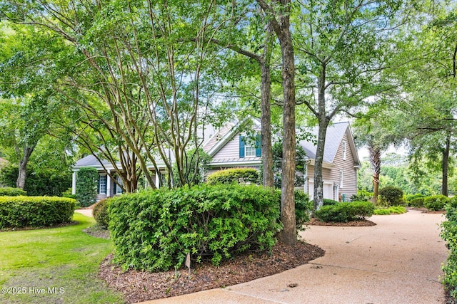 1824 Starfix Ter, Wilmington, NC 28405 - view of side of home featuring concrete driveway
