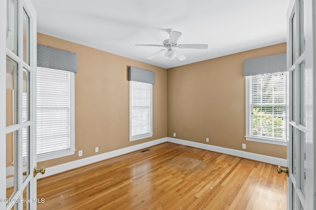 1824 Starfix Ter, Wilmington, NC 28405 - empty room with light wood-style flooring and ceiling fan