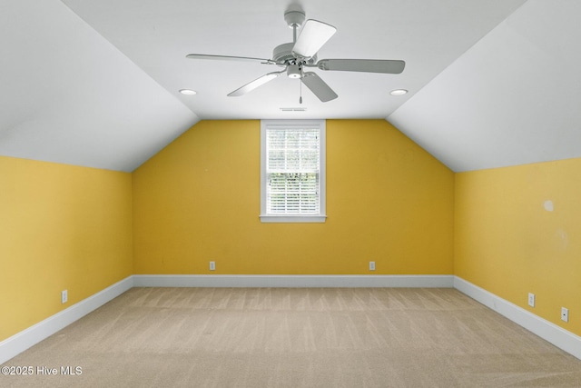 1824 Starfix Ter, Wilmington, NC 28405 - additional living space with light carpet, lofted ceiling, and ceiling fan