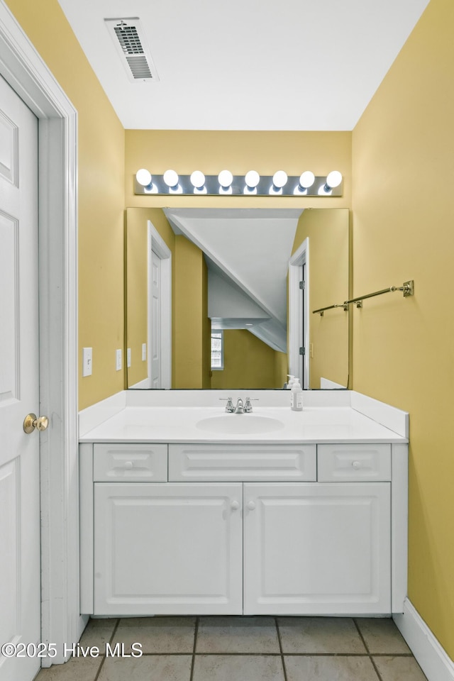 1824 Starfix Ter, Wilmington, NC 28405 - bathroom featuring vanity and tile patterned flooring