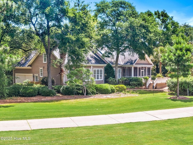 1824 Starfix Ter, Wilmington, NC 28405 - obstructed view of property featuring a front lawn