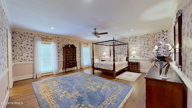 unfurnished bedroom with hardwood / wood-style flooring and ornamental molding