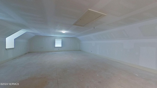 bonus room featuring lofted ceiling