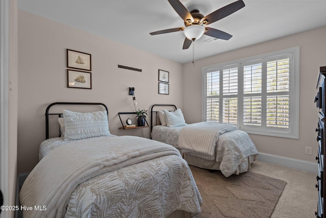 bedroom with light colored carpet and ceiling fan