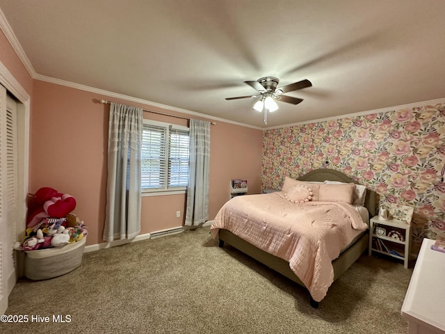 carpeted bedroom with crown molding, ceiling fan, and a closet