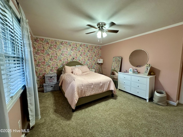 bedroom with crown molding, ceiling fan, and carpet