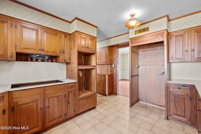 kitchen featuring crown molding