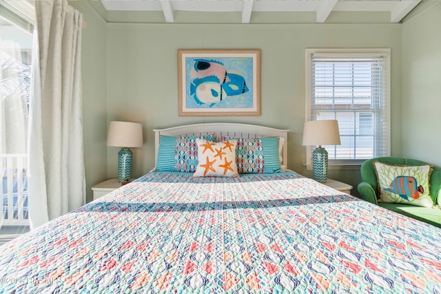 bedroom featuring beam ceiling