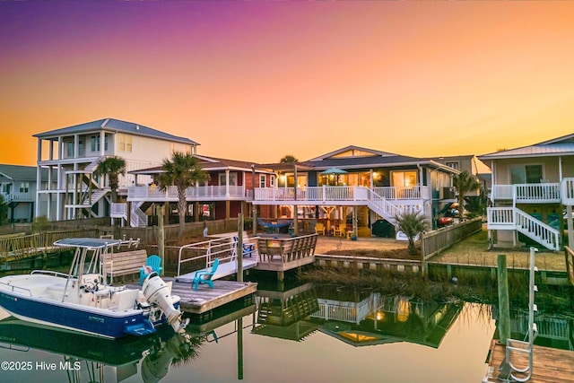 rear view of house with a water view