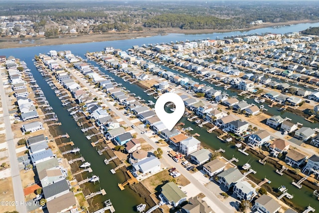 aerial view with a water view and a residential view