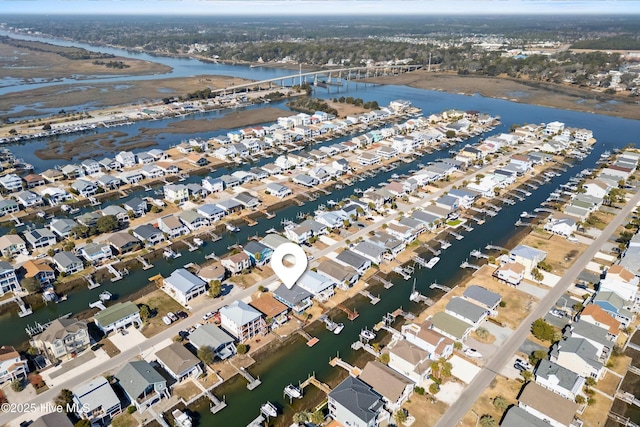 aerial view featuring a residential view and a water view