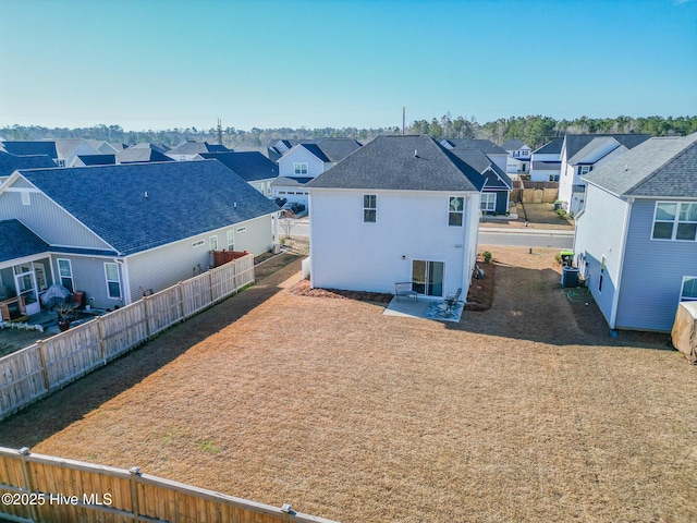 back of property featuring a patio